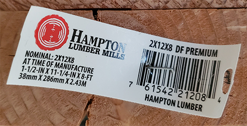 Lumber tag. Here you can see the dimensions of the piece of lumber selected to be used for shelf making.