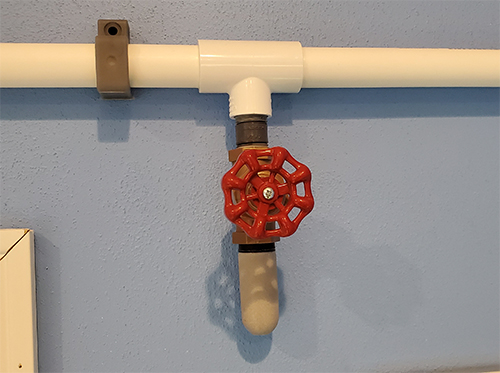 Close up shot of the bleed valve assembled. Here you can see the valve and air diffuser. The diffuser acts like a muffler would a vehicle. Helping reduce the sound produced by the entire central air system.