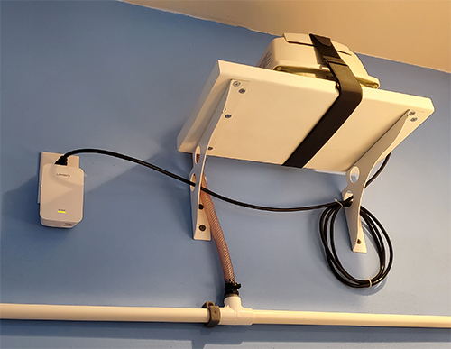 Photo highlights the placement of an electrical outlet. Here we are highlighting the height in relation to the room.